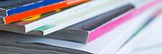 pile-colorful-magazines-table