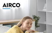 Airco, vrouw die in zetel zit
